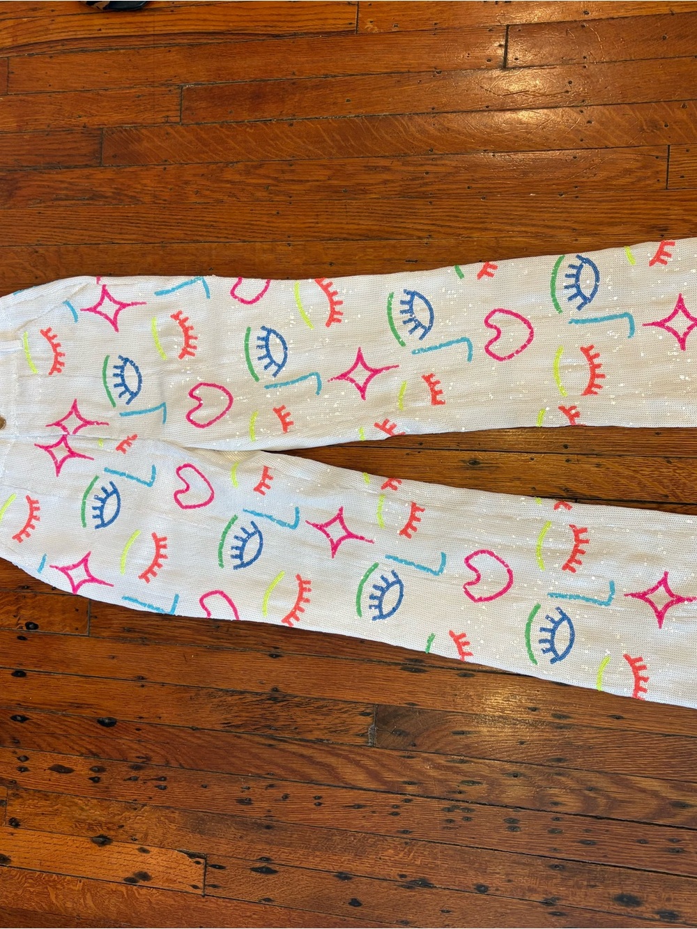 QUEEN OF SPARKLES White Wide-Leg Pants with Neon Eye & Heart Print